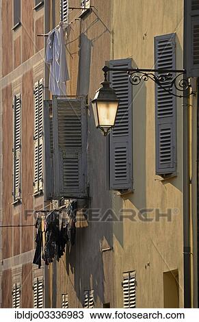 "A street lamp and the facades of houses in Ajaccio. Ajaccio is the capital of the mediterranean island of Corsica, France. It is in the department of Corse-du-Sud, Ajaccio, Corsica, France, Europe" View Large Photo Image Stock Image - "A street lamp and the facades of houses in Ajaccio. Ajaccio is the capital of the mediterranean island of Corsica, France. It is in the department of Corse-du-Sud, Ajaccio, Corsica, France, Europe". Fotosearch