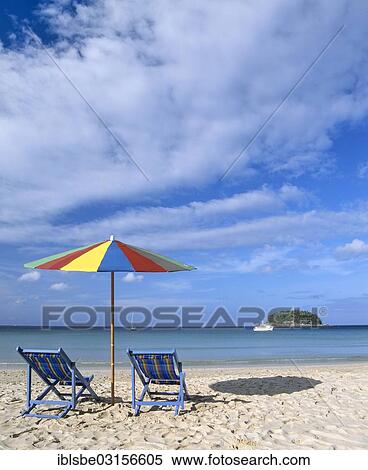 "A sunshade and beach chairs on Kata Beach, the island of Ko Pu at the back, Andaman Sea, Phuket, Phuket Province, Thailand, Asia" View Large Photo Image Stock Photography - "A sunshade and beach chairs on Kata Beach, the island of Ko Pu at the back, Andaman Sea, Phuket, Phuket Province, Thailand, Asia". Fotosearch