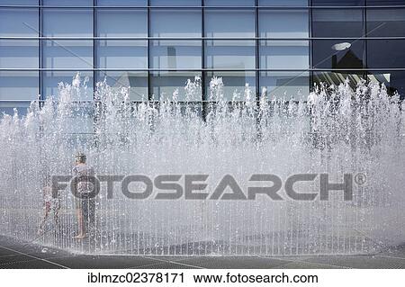 "A temporary, walkable fountain installation by Jeppe Herin, 2007, large glass facade of the Neues Museum at the back, Luitpoldstrasse street 9, Nuremberg, Middle Franconia, Bavaria, Germany, Europe" View Large Photo Image Stock Image - "A temporary, walkable fountain installation by Jeppe Herin, 2007, large glass facade of the Neues Museum at the back, Luitpoldstrasse street 9, Nuremberg, Middle Franconia, Bavaria, Germany, Europe". Fotosearch