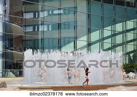 "A temporary, walkable fountain installation by Jeppe Herin, 2007, large glass facade of the Neues Museum at the back, Luitpoldstrasse street 9, Nuremberg, Middle Franconia, Bavaria, Germany, Europe" View Large Photo Image Stock Photo - "A temporary, walkable fountain installation by Jeppe Herin, 2007, large glass facade of the Neues Museum at the back, Luitpoldstrasse street 9, Nuremberg, Middle Franconia, Bavaria, Germany, Europe". Fotosearch