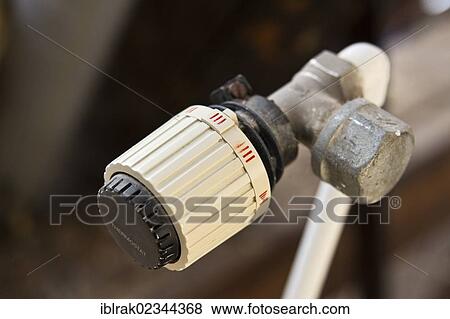 "A thermostat without radiators in a demolished house, Germany, Europe" View Large Photo Image Stock Photo - "A thermostat without radiators in a demolished house, Germany, Europe". Fotosearch