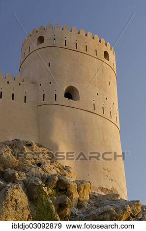 Stock Photo - "A tower of Nakhal Fort or Nakhl Fort, Nakhal, Al Batinah, Oman, Asia". Fotosearch