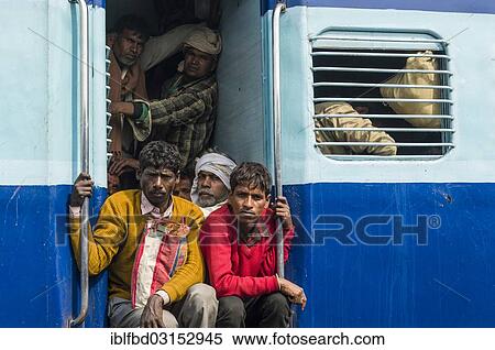 Stock Photography - "A train full of pilgrims at the railway station, Allahabad, Uttar Pradesh, India, Asia". Fotosearch