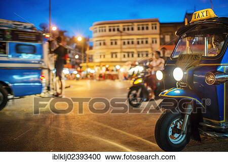 "A tuktuk at a busy intersection at the Waraort Market in Chiang Mai, Thailand, Asia" View Large Photo Image Stock Image - "A tuktuk at a busy intersection at the Waraort Market in Chiang Mai, Thailand, Asia". Fotosearch