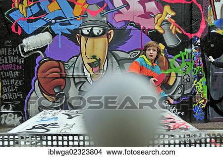 Picture - "A twelve-year-old boy playing table tennis, football area, Cologne, North Rhine-Westphalia, Germany, Europe, PublicGround, Europe". Fotosearch