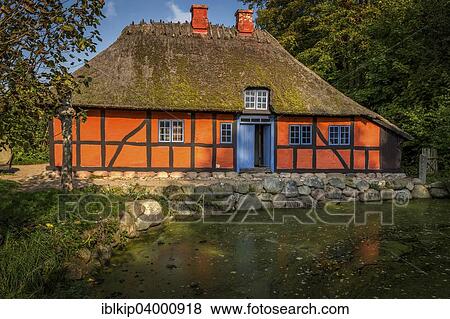 Stock Photo - "A typical Danish blacksmith's house from from 1845, Open Air Museum, Frilandsmuseet, Lyngby, Denmark, Europe". Fotosearch