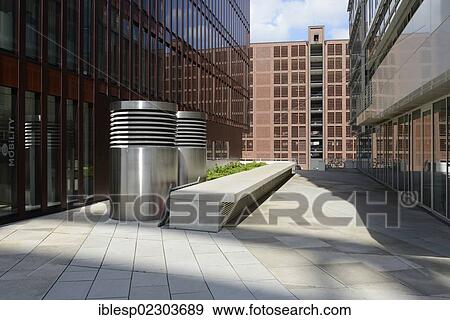 Stock Photo - "A view through modern buildings to multi-storey car park in the warehouse district, Am Sandtorpark street, Am Sandtorkai street, HafenCity, Speicherstadt, Hamburg, Hamburg, Germany, Europe". Fotosearch