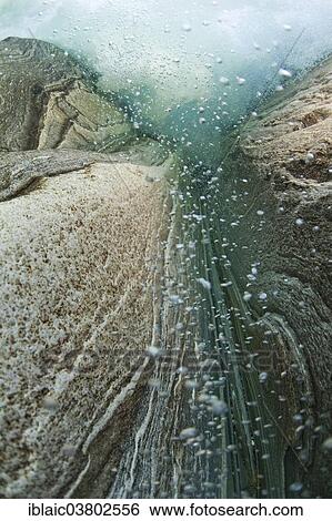 "A waterfall seen from underwater, Verzasca River, Lavertezzo, Valle Verzasca valley, Canton of Ticino, Switzerland, Europe" View Large Photo Image Stock Photograph - "A waterfall seen from underwater, Verzasca River, Lavertezzo, Valle Verzasca valley, Canton of Ticino, Switzerland, Europe". Fotosearch