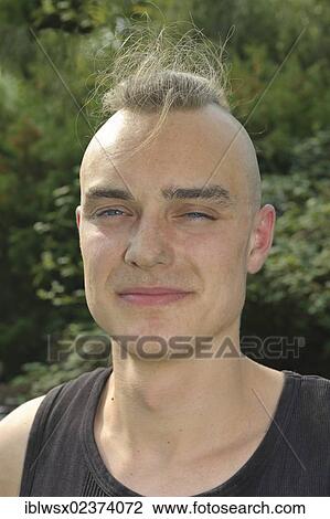 "A young man with partly shaved head, dusty from work on a construction site, portrait, Baden-Wuerttemberg, Germany, Europe, Europe" View Large Photo Image Stock Image - "A young man with partly shaved head, dusty from work on a construction site, portrait, Baden-Wuerttemberg, Germany, Europe, Europe". Fotosearch