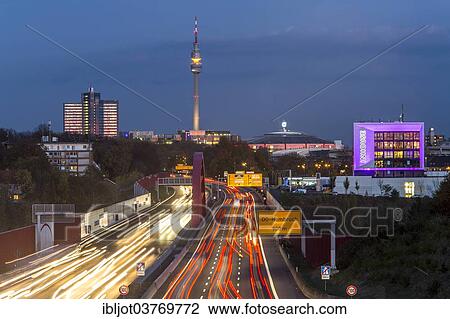 "A40 motorway or Ruhrschnellweg with the skyline of Dortmund, with Florian Tower at the rear, Dortmund, North Rhine-Westphalia, Germany, Europe" View Large Photo Image Stock Image - "A40 motorway or Ruhrschnellweg with the skyline of Dortmund, with Florian Tower at the rear, Dortmund, North Rhine-Westphalia, Germany, Europe". Fotosearch