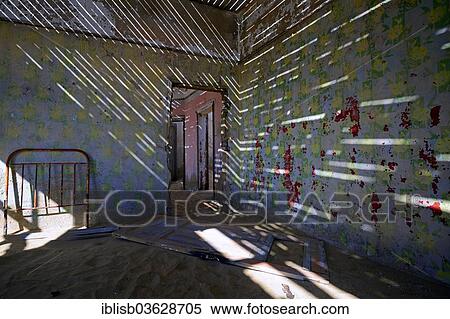 Stock Photography - "Abandoned building in the former diamond mining town, now a ghost town, Kolmanskop, Luderitz, Karas Region, Namibia, Africa". Fotosearch