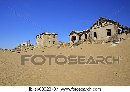"Abandoned houses in the desert, former diamond mining town, now a ghost town, Kolmanskop, Luderitz, Karas Region, Namibia, Africa" View Large Photo Image Stock Photo - "Abandoned houses in the desert, former diamond mining town, now a ghost town, Kolmanskop, Luderitz, Karas Region, Namibia, Africa". Fotosearch
