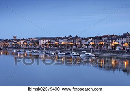 Stock Image - "Abbey Church of St. Philibert and Saone river, Tournus, Departement Saone-et-Loire, France, Europe". Fotosearch