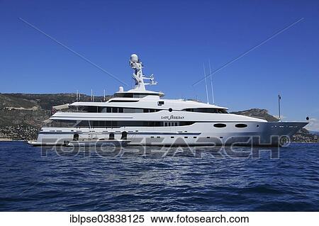 Stock Photography - "Abeking & Rasmussen motor yacht Lady Sheridan at anchor in front of Eze Bord de Mer, Maritime Alps, Provence Alpes Cote d'Azur, France, Europe". Fotosearch