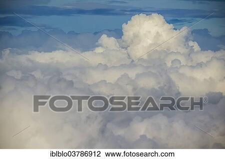 Stock Image - "Above the clouds, cumulus altus, stratocumulus, Mecklenburg-Vorpommern, Germany, Europe". Fotosearch