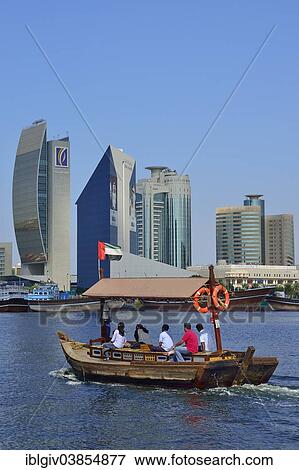 "Abra on Dubai Creek in front of Deira, Dubai, United Arab Emirates, Asia" View Large Photo Image Stock Photo - "Abra on Dubai Creek in front of Deira, Dubai, United Arab Emirates, Asia". Fotosearch