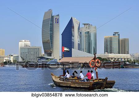 "Abra on Dubai Creek in front of Deira, Dubai, United Arab Emirates, Asia" View Large Photo Image Stock Photo - "Abra on Dubai Creek in front of Deira, Dubai, United Arab Emirates, Asia". Fotosearch