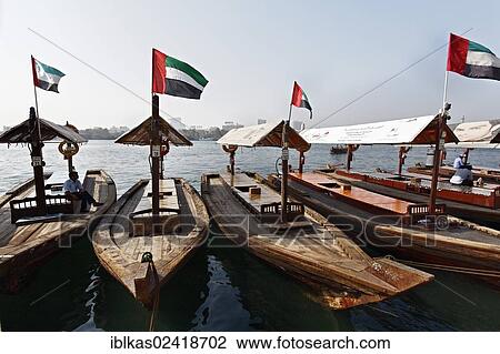 Abra station, traditional water taxis, on Dubai Creek, Dubai, United Arab Emirates, Middle East, Asia View Large Photo Image Stock Image - Abra station, traditional water taxis, on Dubai Creek, Dubai, United Arab Emirates, Middle East, Asia. Fotosearch