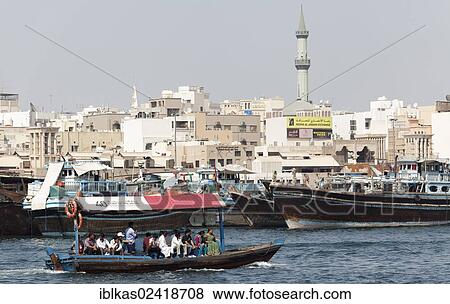 Abra, traditional water taxis on Dubai Creek, overlooking the Deira district, Dubai, United Arab Emirates, Middle East, Asia View Large Photo Image Stock Photo - Abra, traditional water taxis on Dubai Creek, overlooking the Deira district, Dubai, United Arab Emirates, Middle East, Asia. Fotosearch