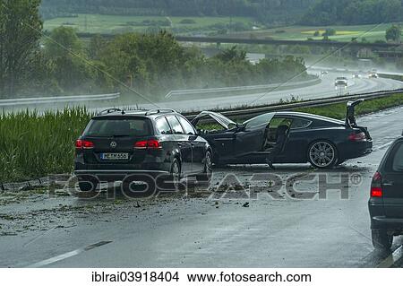 "Accident in heavy rain and poor visibility, car skidded and crashed, A9 motorway, near Thalmassing, Middle Franconia, Franconia, Bavaria, Germany, Europe" View Large Photo Image Picture - "Accident in heavy rain and poor visibility, car skidded and crashed, A9 motorway, near Thalmassing, Middle Franconia, Franconia, Bavaria, Germany, Europe". Fotosearch