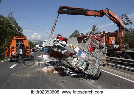"Accident with a mobile elevating working platform, on the B9 road near Weissenthurm, Rhineland-Palatinate, Germany, Europe" View Large Photo Image Stock Photo - "Accident with a mobile elevating working platform, on the B9 road near Weissenthurm, Rhineland-Palatinate, Germany, Europe". Fotosearch