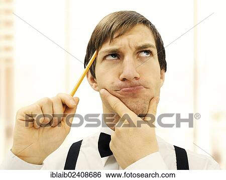 "Accountant, clerk with a pensive face, hollding a pencil, portrait" View Large Photo Image Stock Photograph - "Accountant, clerk with a pensive face, hollding a pencil, portrait". Fotosearch