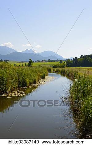 Stock Image - "Ach River at Lake Hopfensee, Hopfen am See, Allgau, Upper Bavaria, Bavaria, Germany, Europe". Fotosearch