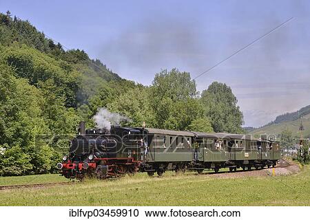 "Achertalbahn, Achertal railway, historic steam train, Furschenbach, Ottenhofen im Schwarzwald, Black Forest, Baden-Wurttemberg, Germany, Europe" View Large Photo Image Stock Image - "Achertalbahn, Achertal railway, historic steam train, Furschenbach, Ottenhofen im Schwarzwald, Black Forest, Baden-Wurttemberg, Germany, Europe". Fotosearch