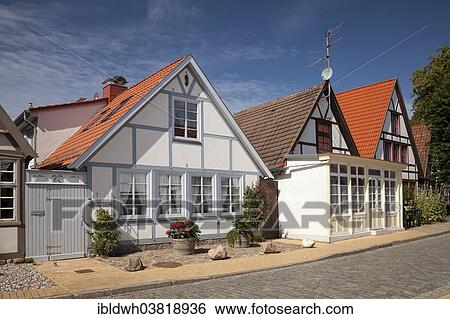 Stock Photograph - "Achterreeg"""" houses in Alexandrinnenstrasse, Warnemunde, Rostock, Mecklenburg-Vorpommern, Germany, Europe". Fotosearch