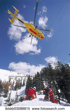 "ADAC helicopter during a mountain rescue, Spitzingsee, Schliersee, Upper Bavaria, Bavaria, Germany, Europe" View Large Photo Image Stock Photography - "ADAC helicopter during a mountain rescue, Spitzingsee, Schliersee, Upper Bavaria, Bavaria, Germany, Europe". Fotosearch