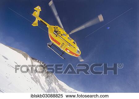 "ADAC helicopter during a mountain rescue, Spitzingsee, Schliersee, Upper Bavaria, Bavaria, Germany, Europe" View Large Photo Image Stock Photography - "ADAC helicopter during a mountain rescue, Spitzingsee, Schliersee, Upper Bavaria, Bavaria, Germany, Europe". Fotosearch