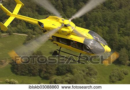 "ADAC helicopter flying over a forest, Oberschleissheim, Munich, Upper Bavaria, Bavaria, Germany, Europe" View Large Photo Image Stock Image - "ADAC helicopter flying over a forest, Oberschleissheim, Munich, Upper Bavaria, Bavaria, Germany, Europe". Fotosearch