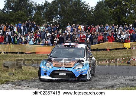 "ADAC Rally Deutschland, special stage, Baumholder military training area, Mads Oestberg, NOR, and co-driver Jonas Andersson, SWE, on Ford, Baumholder, Rhineland-Palatinate, Germany, Europe" View Large Photo Image Stock Photo - "ADAC Rally Deutschland, special stage, Baumholder military training area, Mads Oestberg, NOR, and co-driver Jonas Andersson, SWE, on Ford, Baumholder, Rhineland-Palatinate, Germany, Europe". Fotosearch
