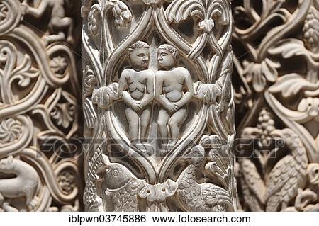 Stock Photograph - "Adam and Eve sculpted in the medieval columns of the cloisters of Monreale Cathedral, Palermo, Sicily, Italy, Europe". Fotosearch