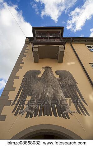 "Adler fresco under a bay window on a house facade, Wangen, Allgau, Bavaria, Germany, Europe" View Large Photo Image Stock Image - "Adler fresco under a bay window on a house facade, Wangen, Allgau, Bavaria, Germany, Europe". Fotosearch