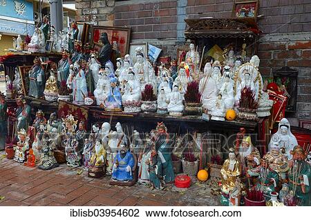 "Adoration figures with incense on a small altar in the street, Kowloon, Hong Kong, China, Asia" View Large Photo Image Stock Image - "Adoration figures with incense on a small altar in the street, Kowloon, Hong Kong, China, Asia". Fotosearch