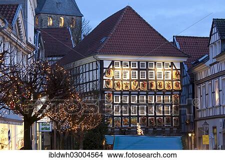 Picture - "Advent calendar on the facade of the old town hall in the old town at dusk, Hattingen, Ruhr district, North Rhine-Westphalia, Germany, Europe". Fotosearch