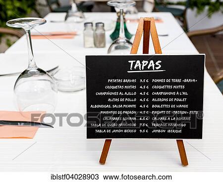 "Advertising for tapas, typical Spanish appetizers, restaurant in Cala d'Or, Majorca, Balearic Islands, Spain, Europe" View Large Photo Image Stock Image - "Advertising for tapas, typical Spanish appetizers, restaurant in Cala d'Or, Majorca, Balearic Islands, Spain, Europe". Fotosearch