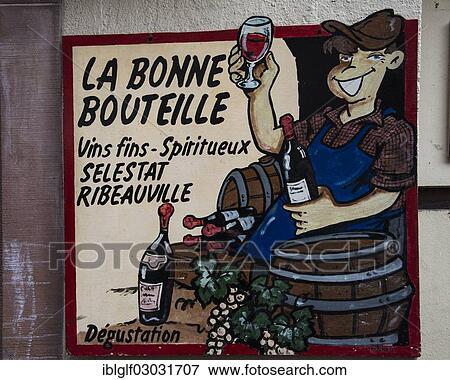 "Advertising sign of a wine store, historic center, Ribeauville, Alsace, France, Europe" View Large Photo Image Stock Photo - "Advertising sign of a wine store, historic center, Ribeauville, Alsace, France, Europe". Fotosearch