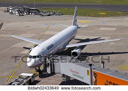 "AegeanAir SX-DGA Airbus A 321-232 aircraft being attached to a jetway or passenger boarding bridge on the airport apron, Duesseldorf International Airport, Duesseldorf, North Rhine-Westphalia, Germany, Europe" View Large Photo Image Stock Photo - "AegeanAir SX-DGA Airbus A 321-232 aircraft being attached to a jetway or passenger boarding bridge on the airport apron, Duesseldorf International Airport, Duesseldorf, North Rhine-Westphalia, Germany, Europe". Fotosearch