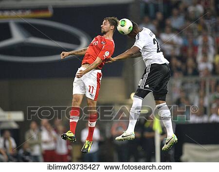 "Aerial duel between the DFB national player Jerome Boateng, right, and Martin Harnik, AUT, left, Munchen, Bavaria, Germany, Europe" View Large Photo Image Stock Photo - "Aerial duel between the DFB national player Jerome Boateng, right, and Martin Harnik, AUT, left, Munchen, Bavaria, Germany, Europe". Fotosearch