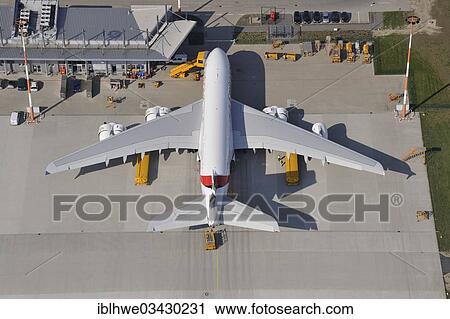 Stock Image - "Aerial view, Airbus A380 being prepared for delivery at the factory airfield of Finkenwerder, Finkenwerder, Hamburg, Hamburg, Germany, Europe". Fotosearch
