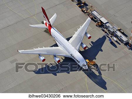 Stock Photograph - "Aerial view, Airbus A380 from Qantas being prepared for delivery at the factory airfield of Finkenwerder, Finkenwerder, Hamburg, Hamburg, Germany, Europe". Fotosearch