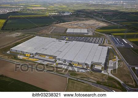 "Aerial view, Amazon building and construction site of the Lidl central warehouse at the freight village on the A61 motorway, Koblenz, Rhineland-Palatinate, Germany, Europe" View Large Photo Image Stock Image - "Aerial view, Amazon building and construction site of the Lidl central warehouse at the freight village on the A61 motorway, Koblenz, Rhineland-Palatinate, Germany, Europe". Fotosearch
