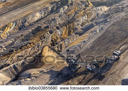 "Aerial view, an open cast mine excavator in the Hambach open pit mine, earth fills, Niederzier, Julich-Zulpicher Borde region, North Rhine-Westphalia, Germany, Europe" View Large Photo Image Stock Image - "Aerial view, an open cast mine excavator in the Hambach open pit mine, earth fills, Niederzier, Julich-Zulpicher Borde region, North Rhine-Westphalia, Germany, Europe". Fotosearch