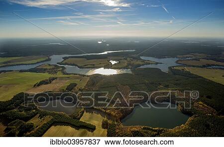 "Aerial view, backlit Lake Palitzsee, Muritz, Mecklenburg Lake District, Wustrow, Mecklenburg-Western Pomerania, Germany, Europe" View Large Photo Image Stock Photo - "Aerial view, backlit Lake Palitzsee, Muritz, Mecklenburg Lake District, Wustrow, Mecklenburg-Western Pomerania, Germany, Europe". Fotosearch