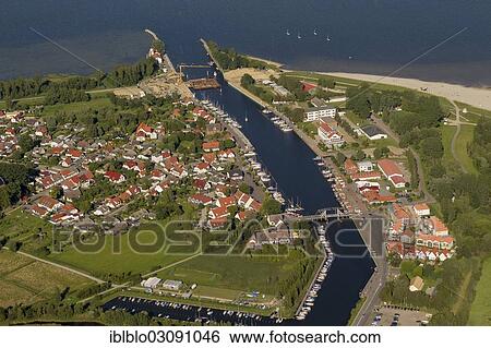 "Aerial view, bascule bridge in Wieck, Peene River flowing into the Bay of Greifswald, Wieck, Bay of Greifswald, Greifswald, Mecklenburg-Western Pomerania, Germany, Europe" View Large Photo Image Stock Photograph - "Aerial view, bascule bridge in Wieck, Peene River flowing into the Bay of Greifswald, Wieck, Bay of Greifswald, Greifswald, Mecklenburg-Western Pomerania, Germany, Europe". Fotosearch