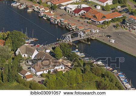 Stock Photo - "Aerial view, bascule bridge on the Peene River, Wieck, Greifswald, Mecklenburg-Western Pomerania, Germany, Europe". Fotosearch