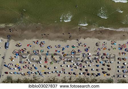"Aerial view, beach life, beach in Binz on the island of Ruegen, Ostseebad, Binz, Mecklenburg-Western Pomerania, Germany, Europe" View Large Photo Image Stock Photo - "Aerial view, beach life, beach in Binz on the island of Ruegen, Ostseebad, Binz, Mecklenburg-Western Pomerania, Germany, Europe". Fotosearch
