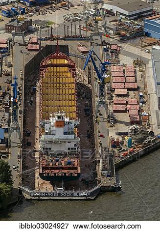 "Aerial view, Blohm & Voss dock, dry dock, hull, steel hull, Hamburg-Port, Hamburg, Hamburg, Germany, Europe" View Large Photo Image Stock Photo - "Aerial view, Blohm & Voss dock, dry dock, hull, steel hull, Hamburg-Port, Hamburg, Hamburg, Germany, Europe". Fotosearch